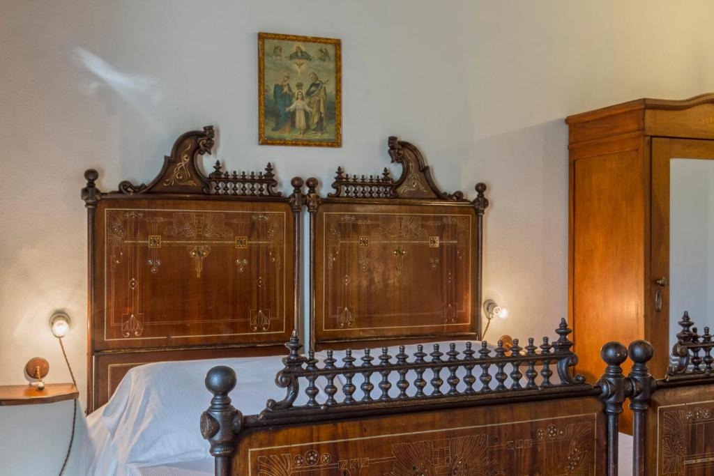 Postel nebo postele na pokoji v ubytování Masseria Fortificata Lo Zafferaneto