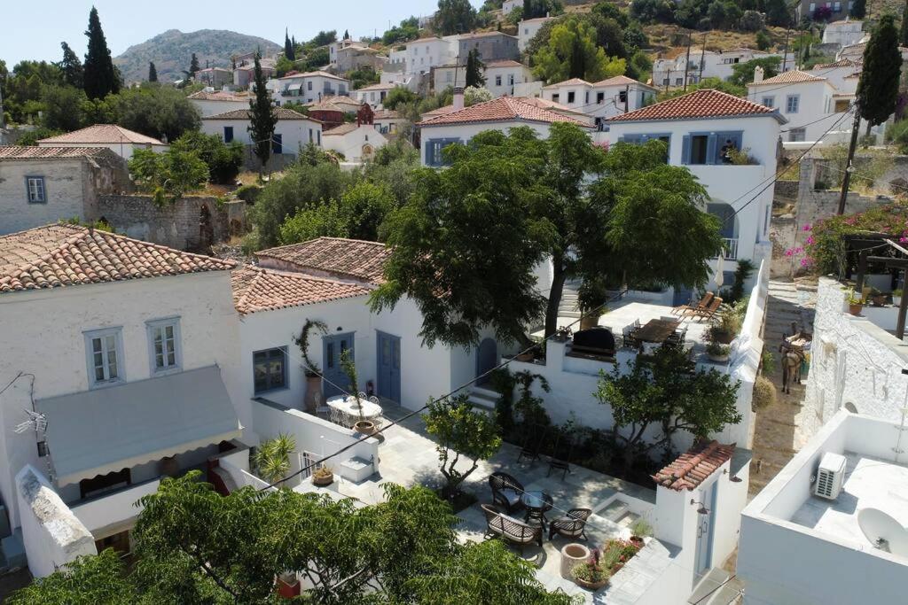 an aerial view of a town with white houses at Nefeli Villa in Hydra
