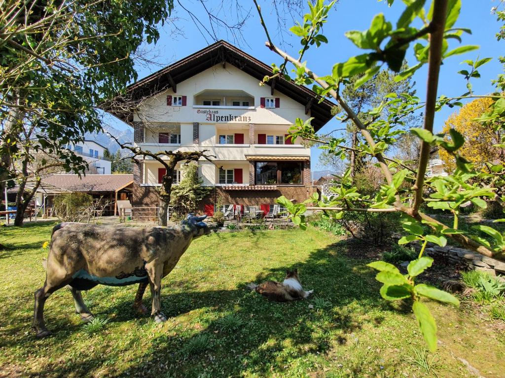 Κήπος έξω από το Gästehaus Alpenkranz