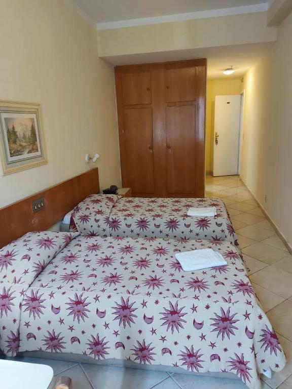 Postel nebo postele na pokoji v ubytování Hotel Pouso Real