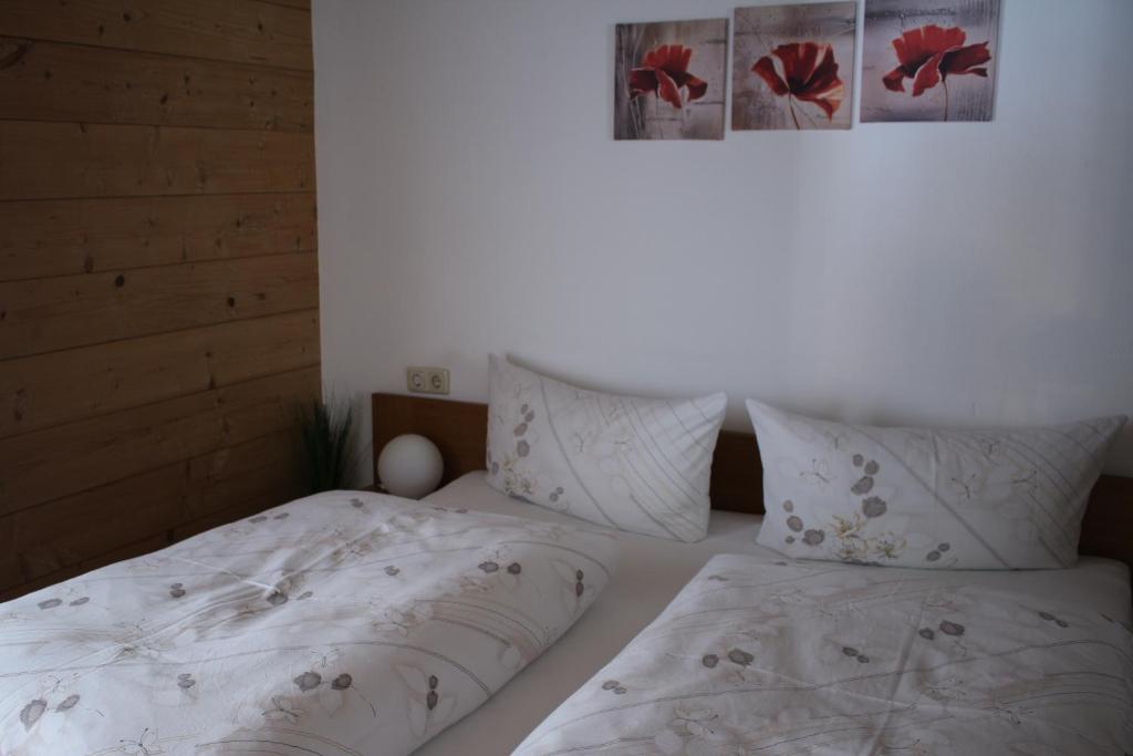 Postel nebo postele na pokoji v ubytování Haus Hermi