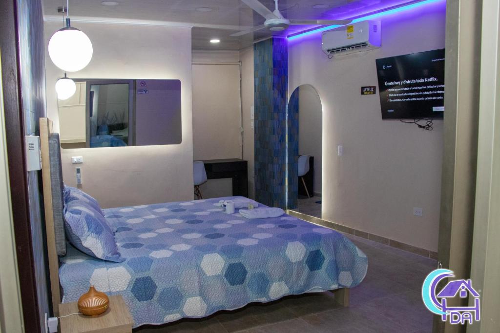 Postel nebo postele na pokoji v ubytování HOTEL DOÑA ANA
