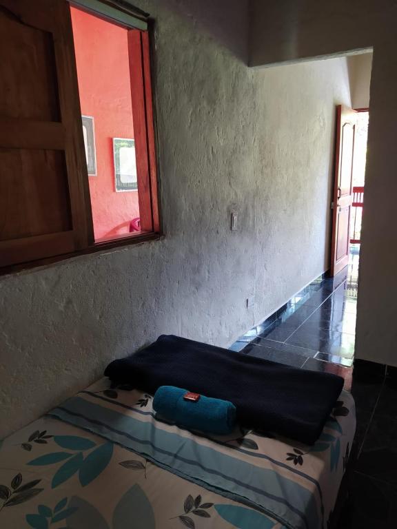 Postel nebo postele na pokoji v ubytování Hotel Orillas del Pizano