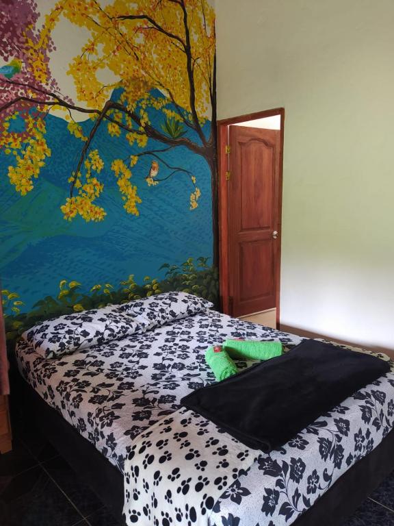 Postel nebo postele na pokoji v ubytování Hotel Orillas del Pizano