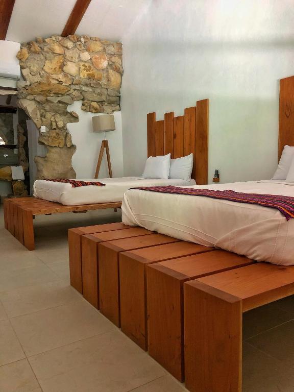 Postel nebo postele na pokoji v ubytování Finca Vallescondido