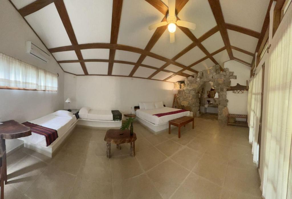 Postel nebo postele na pokoji v ubytování Finca Vallescondido