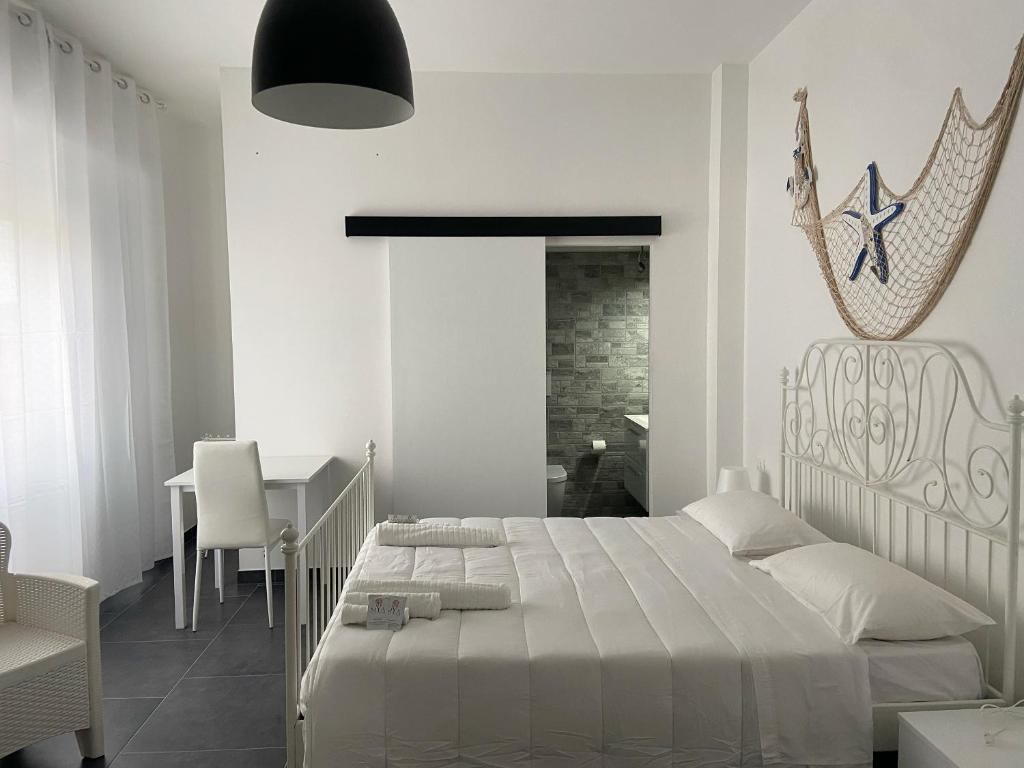 Postel nebo postele na pokoji v ubytování B&B FRONTEMARE San Salvo Marina CH