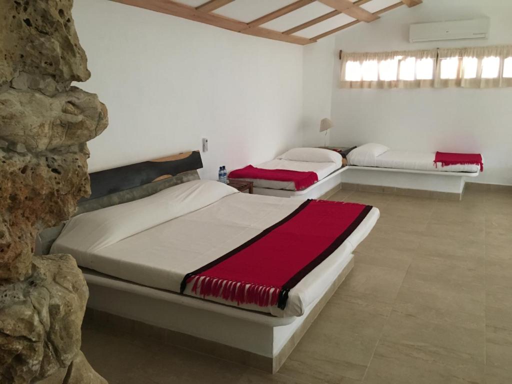 Postel nebo postele na pokoji v ubytování Finca Vallescondido