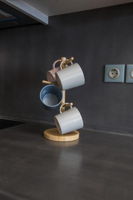 a toilet with two rolls of toilet paper in a room at Raise Spetses Sea View Villa in Spetses