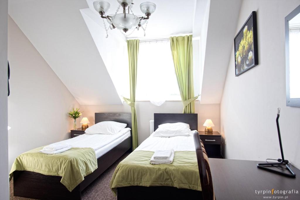 Posteľ alebo postele v izbe v ubytovaní Hotel Millenium