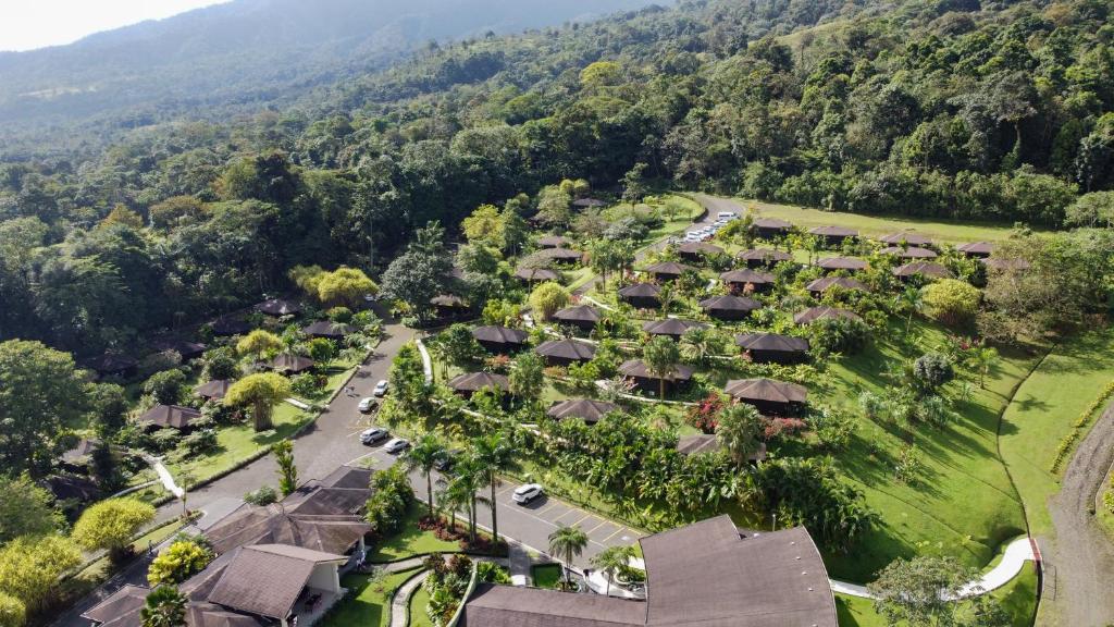 an aerial view of a village with trees and houses at Hotel Lomas del Volcan in Fortuna
