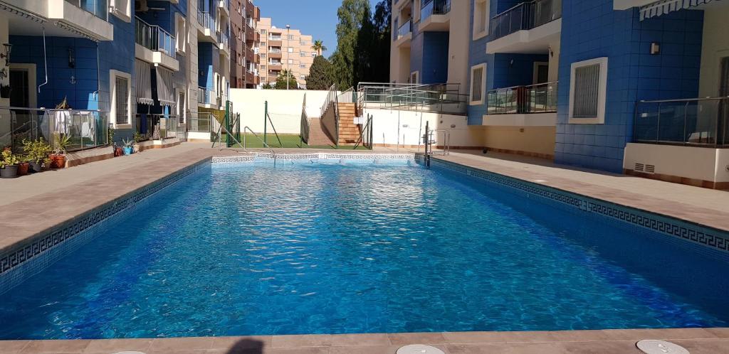 Bazén v ubytovaní Apartment Black Level, 30m playa, Pool, Wifi alebo v jeho blízkosti