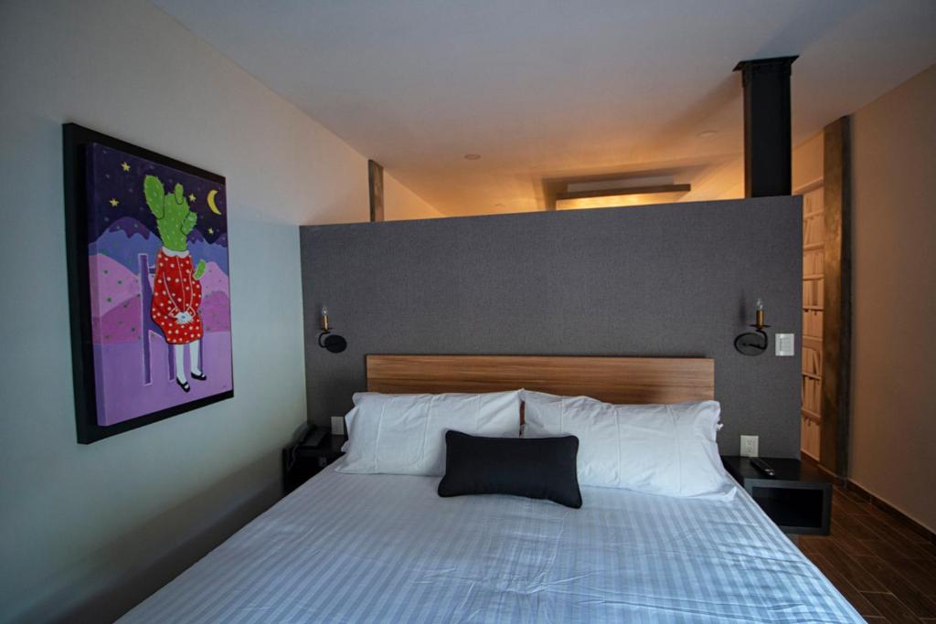 En eller flere senger på et rom på Casa Bruna Luxury Lofts