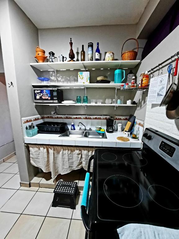 Kuchyň nebo kuchyňský kout v ubytování Cómodo Apartamento privado