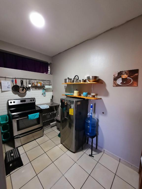 Kuchyň nebo kuchyňský kout v ubytování Cómodo Apartamento privado