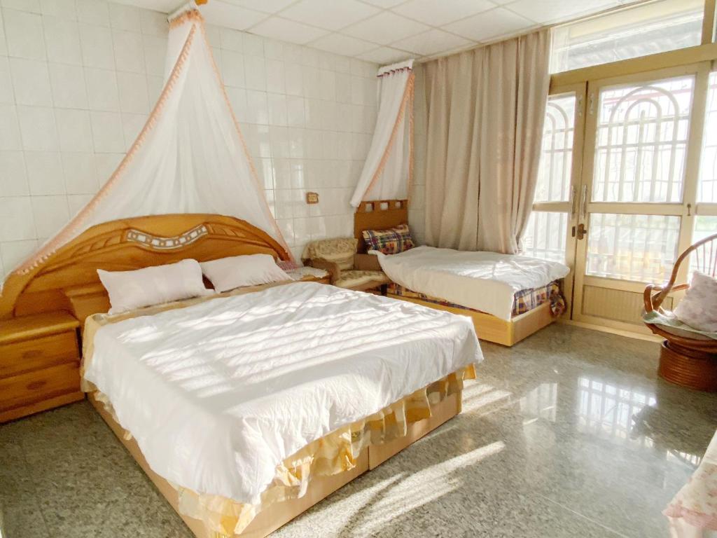 Katil atau katil-katil dalam bilik di Enoya Homestay III