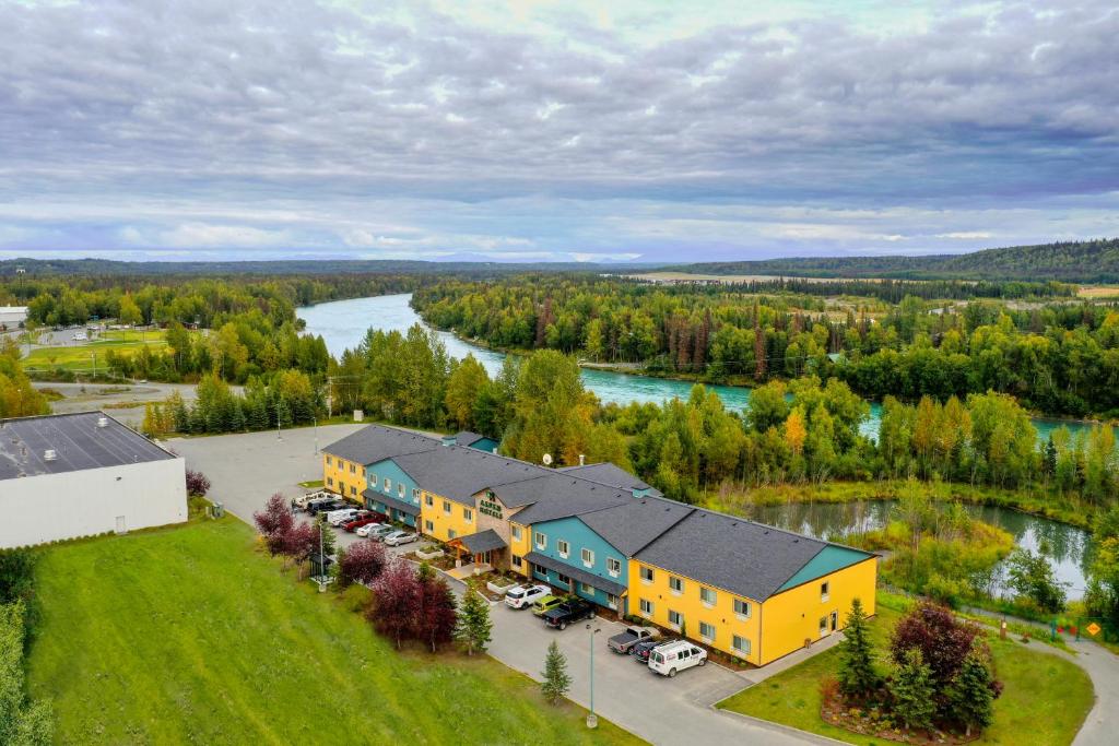 an aerial view of a building next to a river at Aspen Hotel in Soldotna