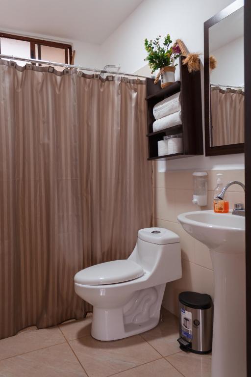 Un baño de Hotel Boutique Victoria