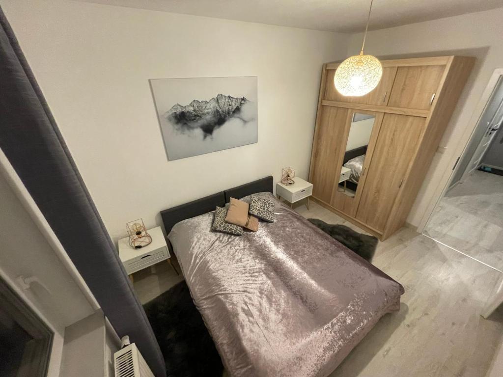 Postel nebo postele na pokoji v ubytování Apartament na Spokojnej