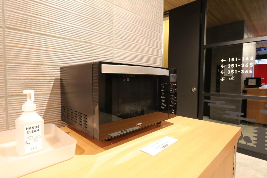 Kuchyň nebo kuchyňský kout v ubytování M's Hotel Sanjo Omiya