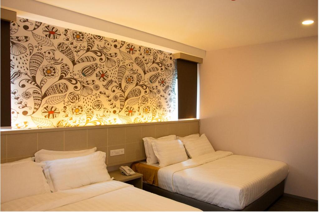 THE CROWN HOTEL @ KLIAにあるベッド