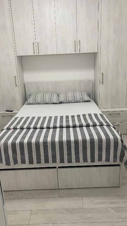 Postel nebo postele na pokoji v ubytování Apartman Petra