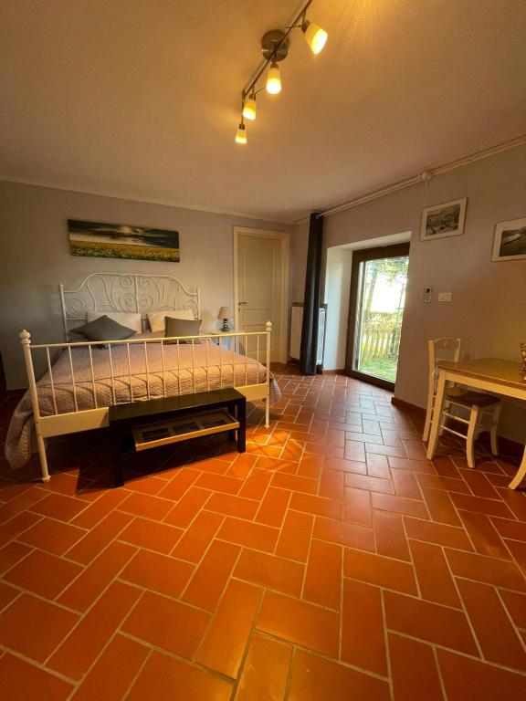 Postel nebo postele na pokoji v ubytování Casa vacanze La Foresteria