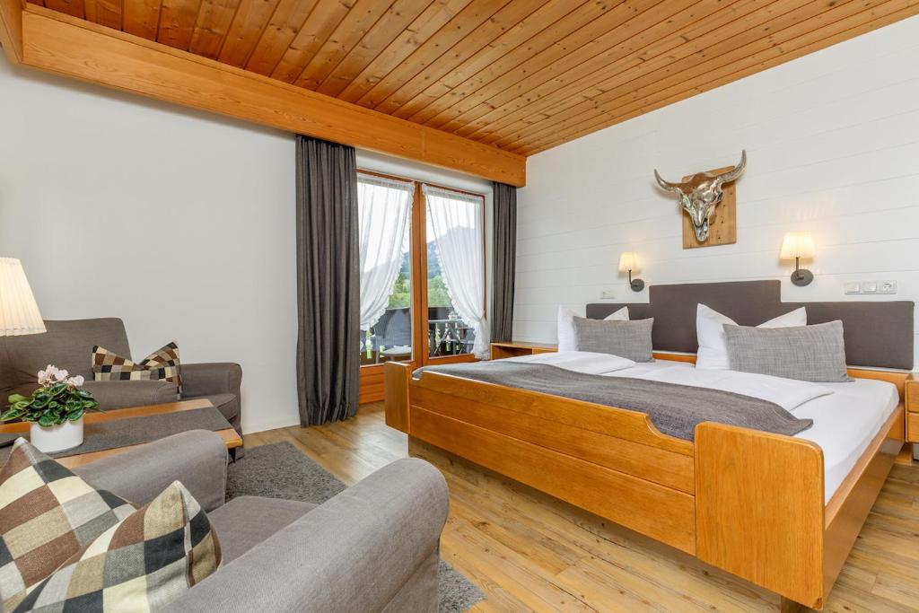 Postel nebo postele na pokoji v ubytování Gästehaus Menkenbauer