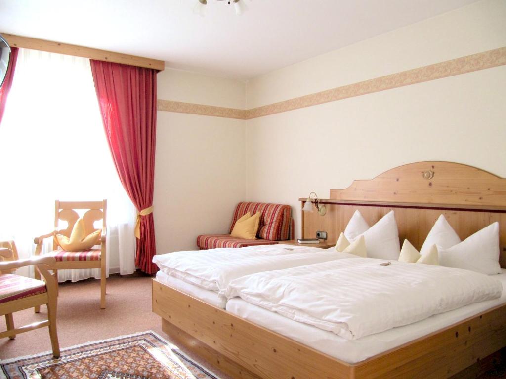 Postel nebo postele na pokoji v ubytování Gästehaus Menkenbauer