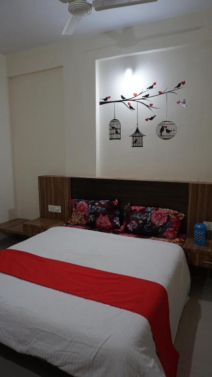 Posteľ alebo postele v izbe v ubytovaní Happy Stay, Panchgani