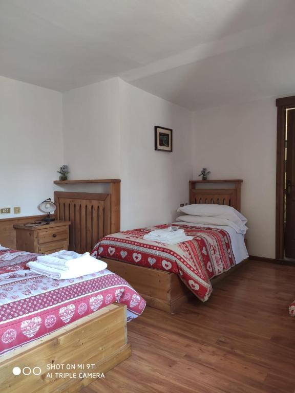 Postel nebo postele na pokoji v ubytování La Favorita
