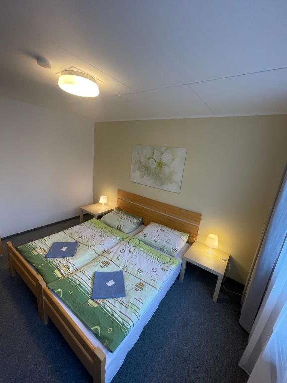 Voodi või voodid majutusasutuse Hostel U Sv. Štěpána toas