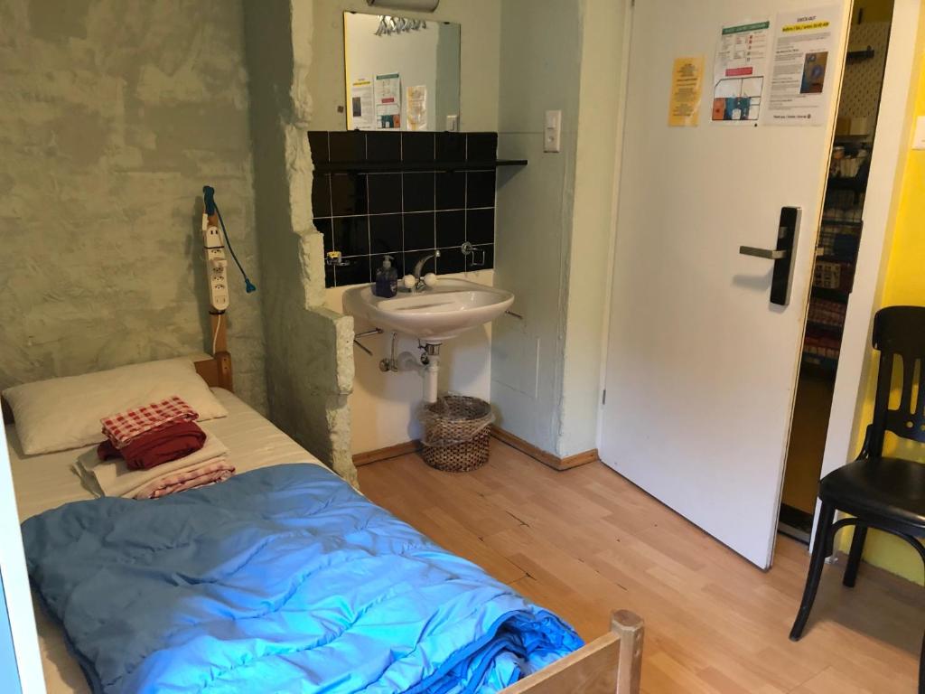 Postel nebo postele na pokoji v ubytování Oldtown Hostel Otter