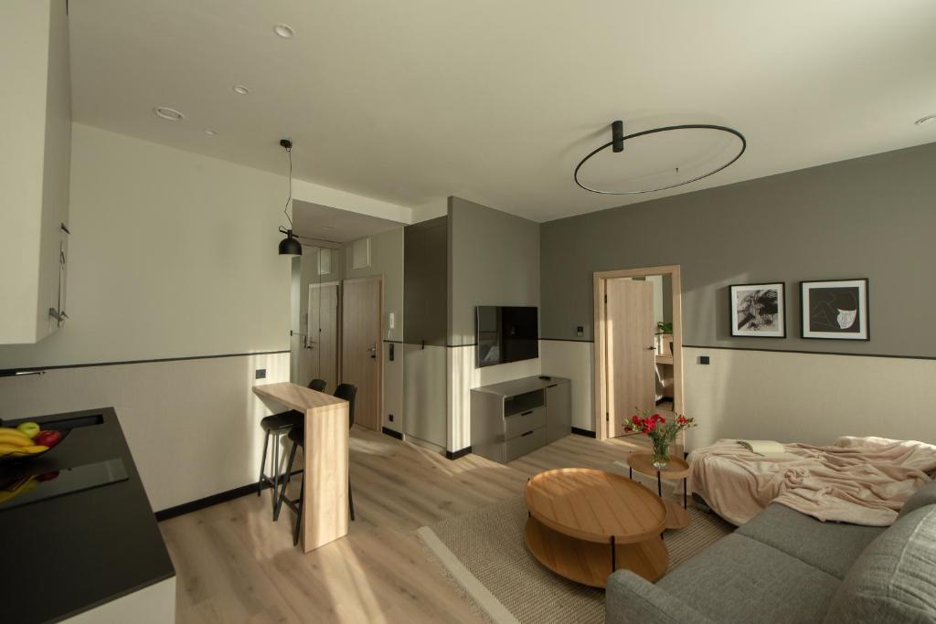 Televízia a/alebo spoločenská miestnosť v ubytovaní Sarnia Point Apartamenty Prestige