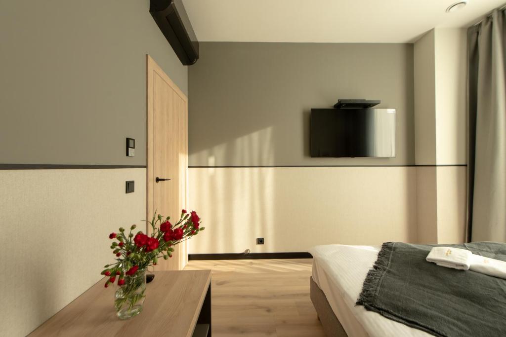 Posteľ alebo postele v izbe v ubytovaní Sarnia Point Apartamenty Prestige
