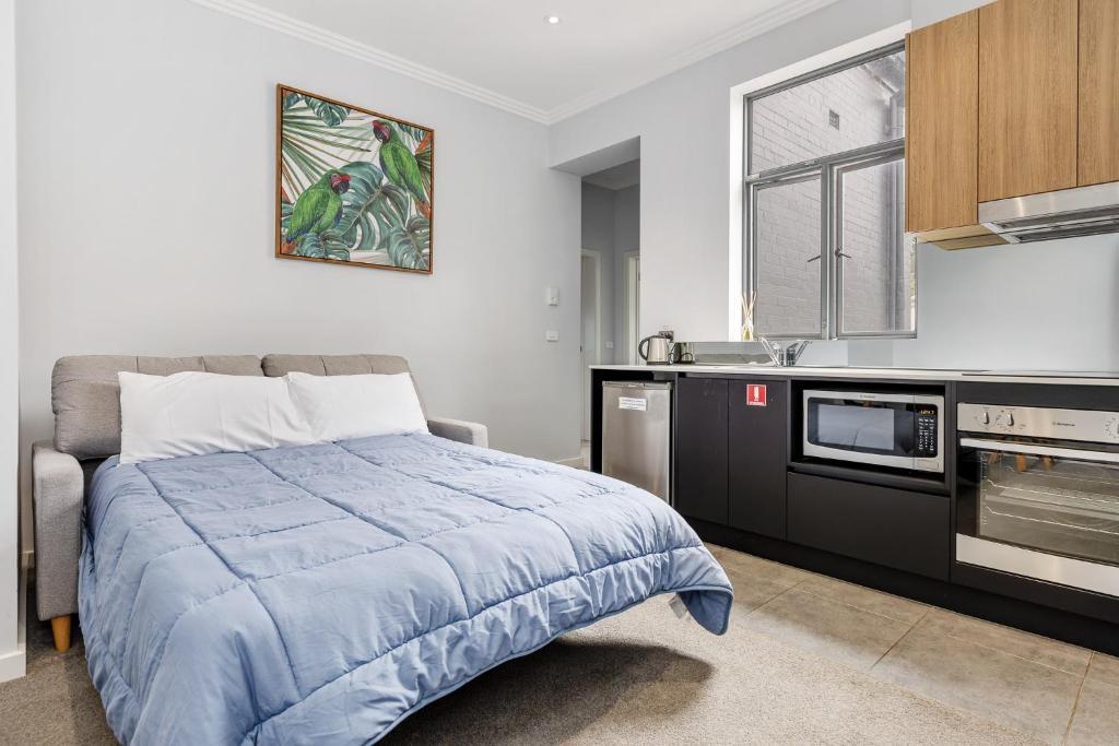 Kuchyň nebo kuchyňský kout v ubytování Civic Apartments