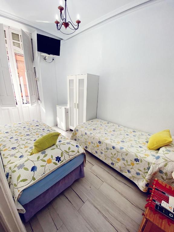 Letto o letti in una camera di Pensión Antonio Guesthouse