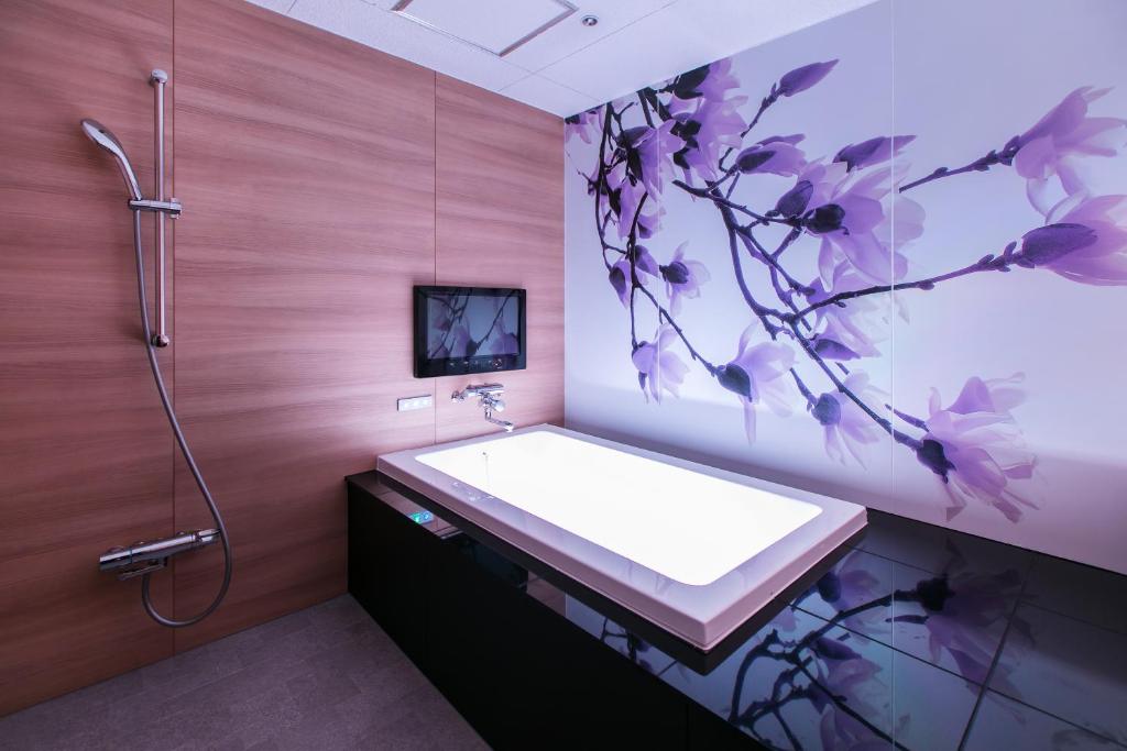 TV a/nebo společenská místnost v ubytování HOTEL 粋