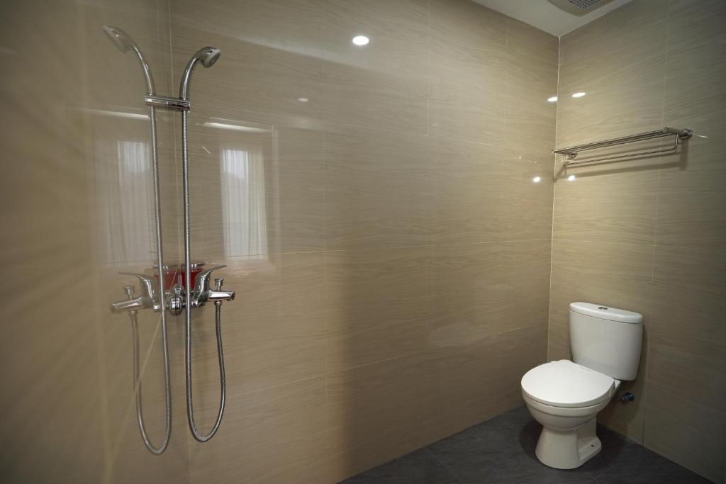Koupelna v ubytování Ngampilan Residence Yogyakarta Mitra RedDoorz