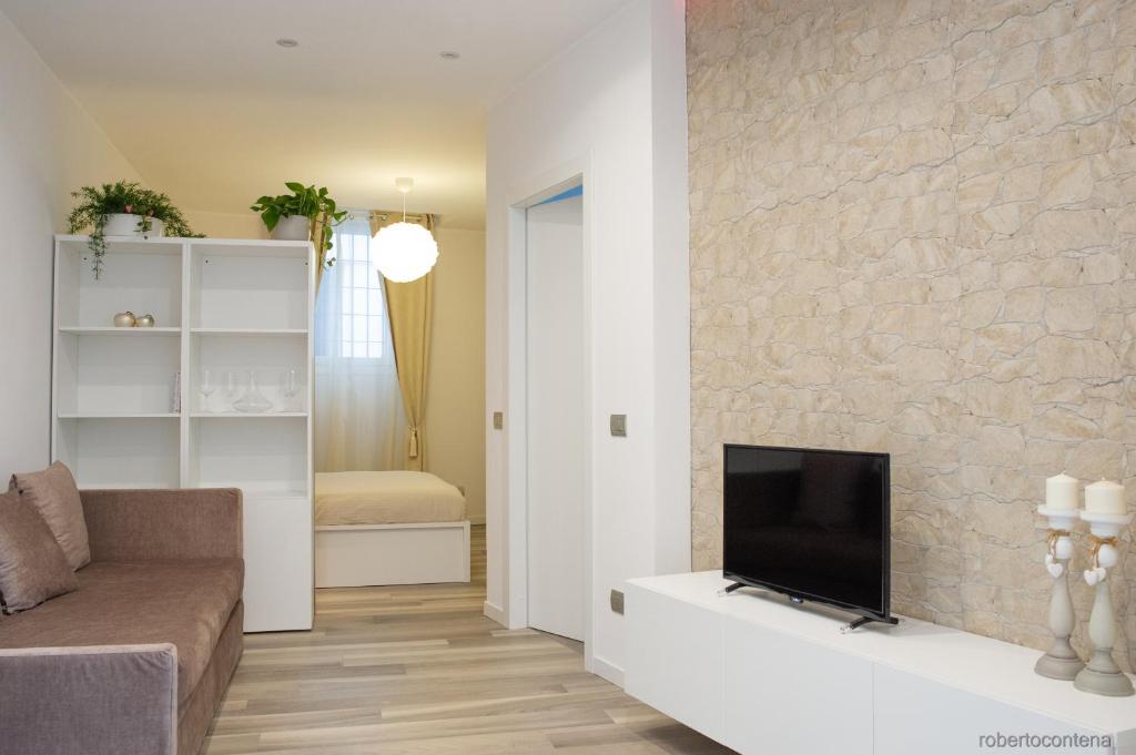 Telewizja i/lub zestaw kina domowego w obiekcie A CASA DI PATTY