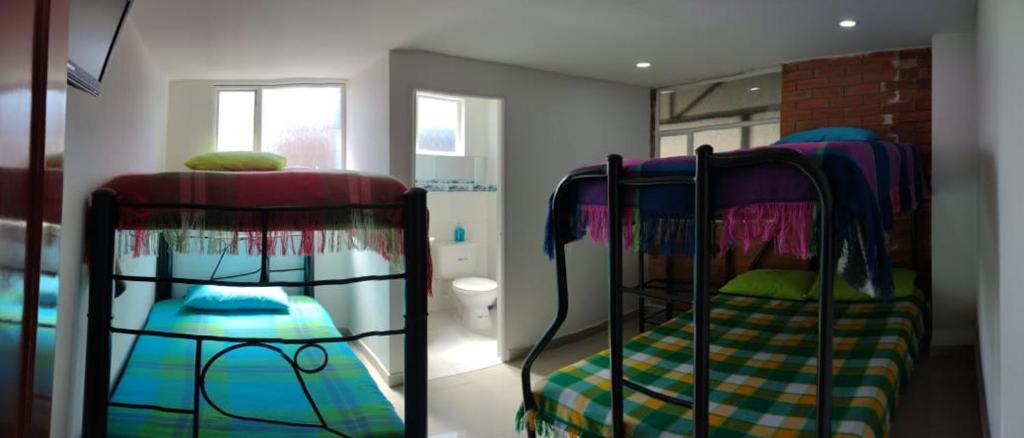 Postel nebo postele na pokoji v ubytování Córest Hotel B&B