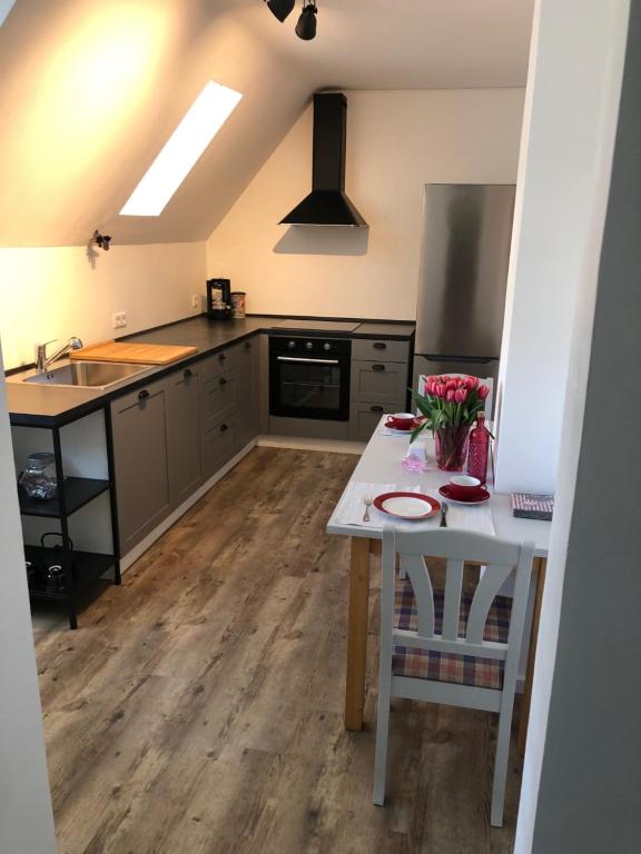 Η κουζίνα ή μικρή κουζίνα στο Bel Art Etage mit großem Parkplatz