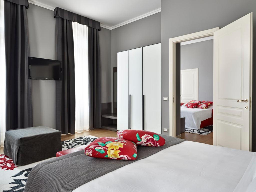 Postel nebo postele na pokoji v ubytování Palace Suite