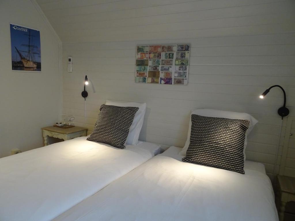 Postel nebo postele na pokoji v ubytování B&B De Passant