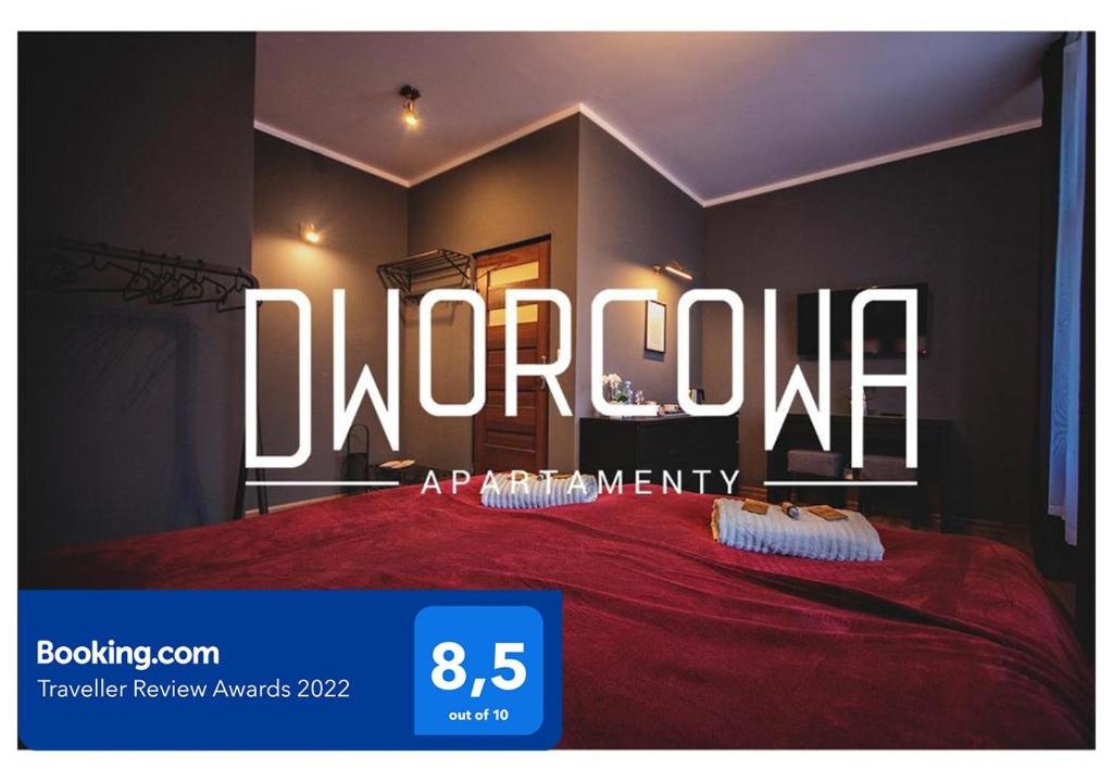 a large sign that says divorceagement in a bedroom at Dworcowa - Apartament in Bydgoszcz