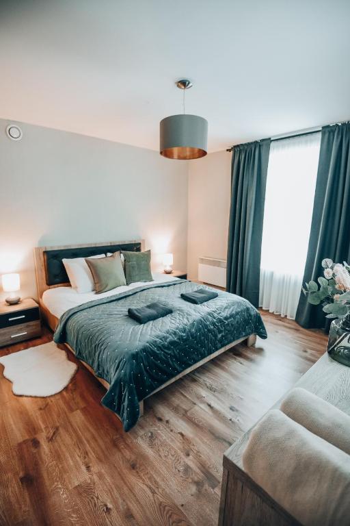 Säng eller sängar i ett rum på Hillhof 44