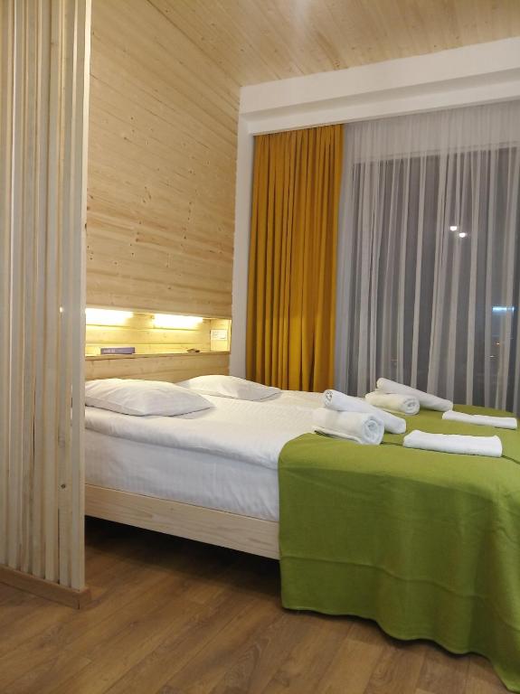 Postel nebo postele na pokoji v ubytování Roshka Apartment 307