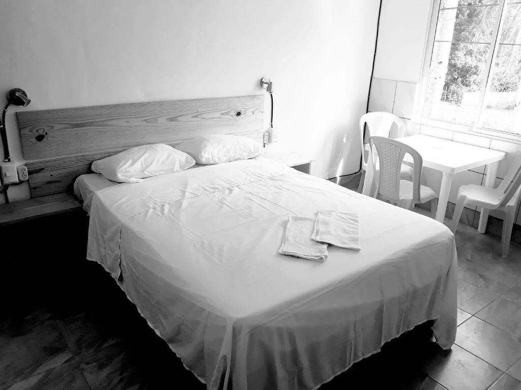 Postel nebo postele na pokoji v ubytování Casa De Matias