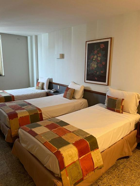 Postel nebo postele na pokoji v ubytování Hotel Atlantico Star