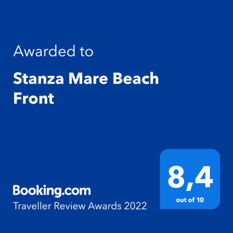 Un certificado, premio, letrero u otro documento en Stanza Mare Beach Front
